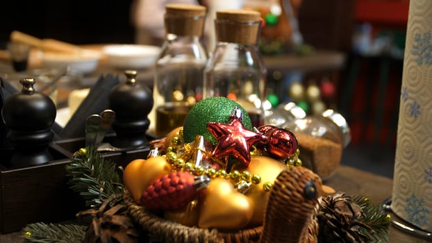 Christmas table setting on wooden, top view. Holidays background. Kitchen wooden table with Christmas decoration photo