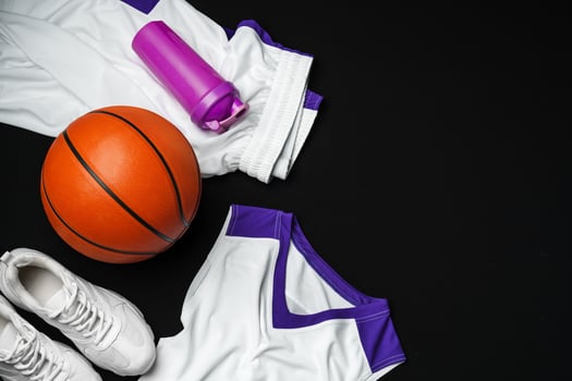 Basketball Gear Prepared for an Evening Training Session on a Dark Backdrop photo