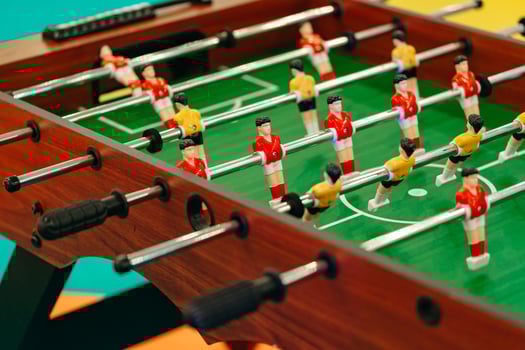Close Up of a Foosball Table With Foosball Players photo