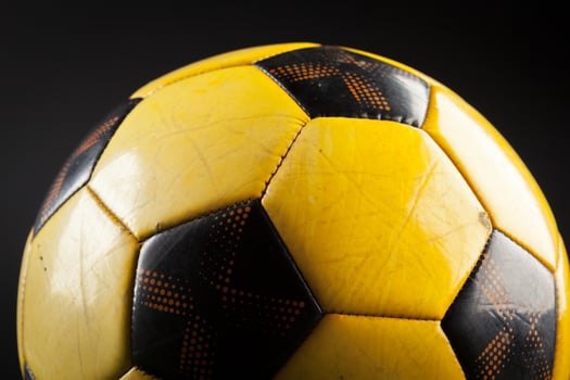 soccer ball on the green field photo