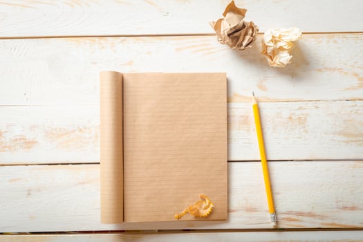 The workplace traveler. The blank notebook. photo
