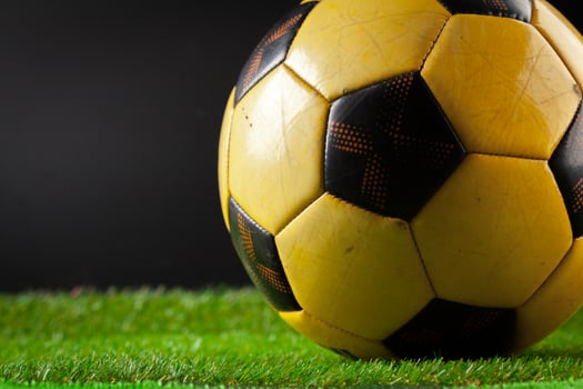soccer ball on the green field photo