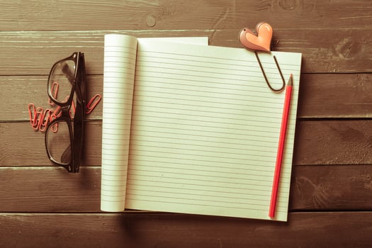 The workplace traveler. The blank notebook. photo