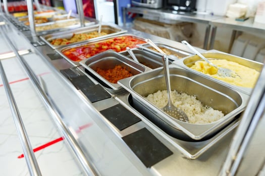 Variety of Food Displayed on Buffet Table photo