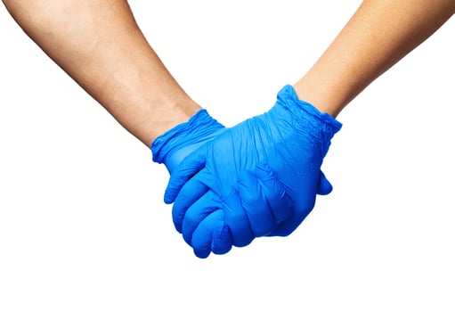 Handshake in a blue gloves, help concept. Personal hygiene during a pandemic photo