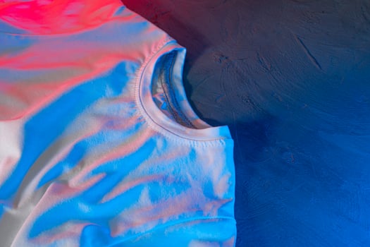 White color unisex t-shirt in neon light photo