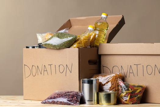 Donation box with various food. Pandemic support. photo
