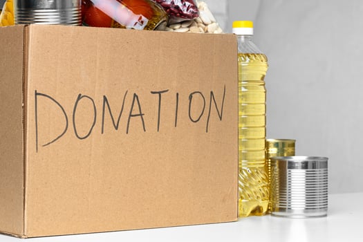 Donation box with various food. Pandemic support. photo