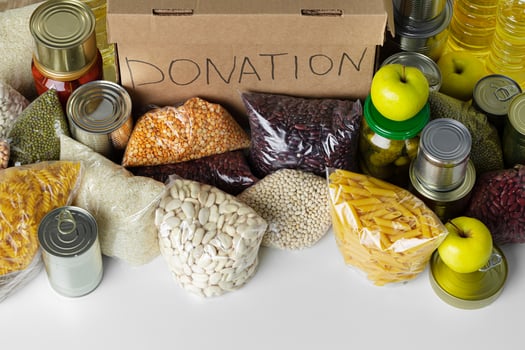 Donation box with various food. Pandemic support. photo