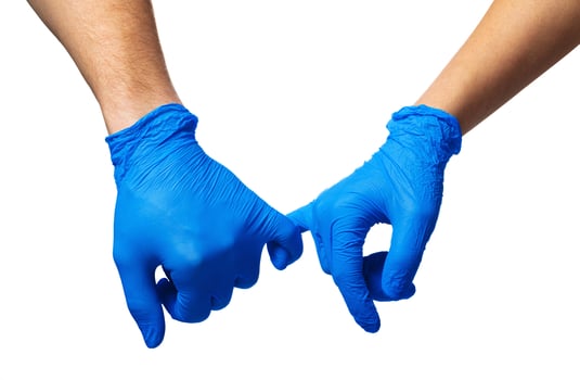 Handshake in a blue gloves, help concept. Personal hygiene during a pandemic photo