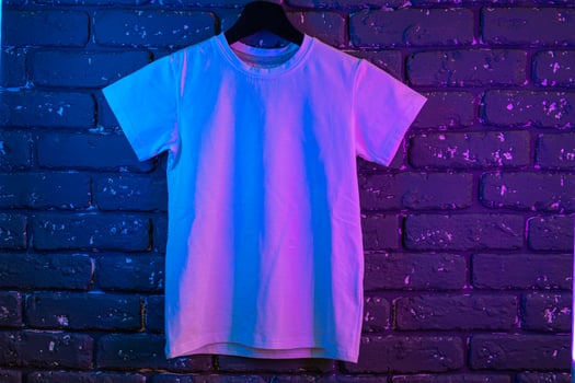 White color unisex t-shirt in neon light photo