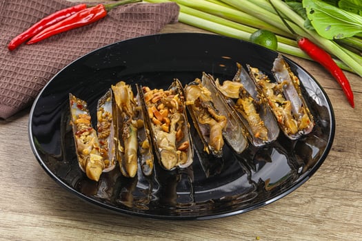 Steamed razor mollusk with lemongrass photo
