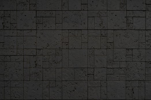 Black brick wall. Abstract construction background. photo