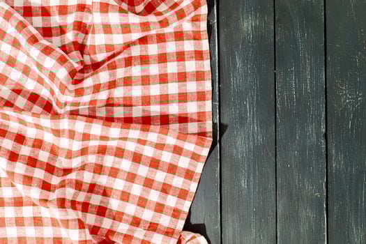 tablecloth on black wooden table photo