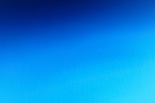 Blank carton paper sheets background in dark blue light photo