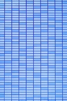 Blue tile wall. Abstract construction background. photo