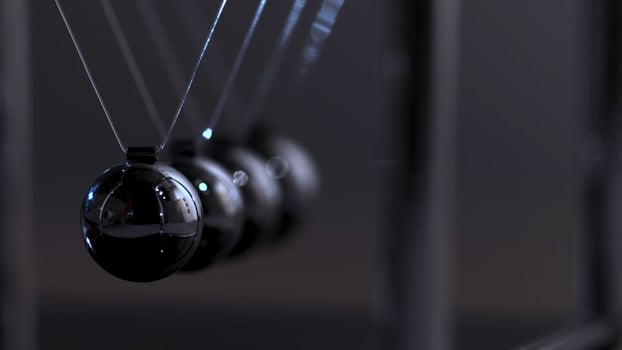 Newton's cradle physics concept for action and reaction or cause and effect. Balls Newton photo