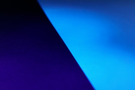 Blank carton paper sheets background in dark blue light photo