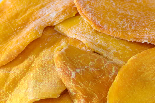 Mango. Dried mango as background. Food background photo