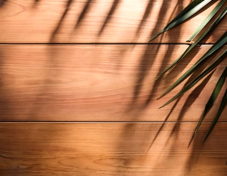 top view of soft brown table with high resolution texture and palm leafs shadows, summer table background with empty space for text or design, soft cozy sunny table backdrop, wooden texture seamless photo