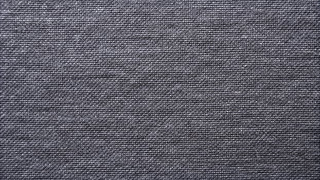 Dark gray cotton fabric sample for background, long shot. photo