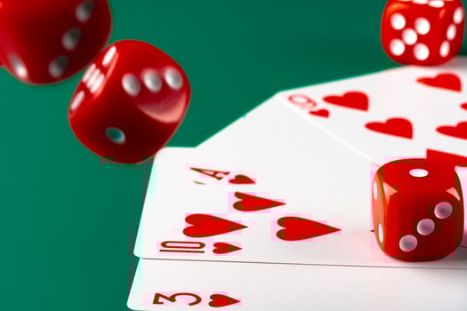 Playing cards with red dice. Casino and gambling concept photo