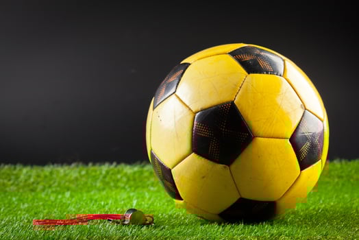 soccer ball on the green field photo
