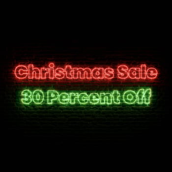 Christmas Sale 30 Percent Off With Brick Background photo