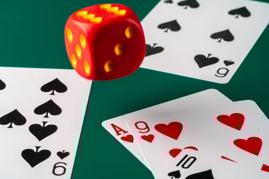 Playing cards with red dice. Casino and gambling concept photo