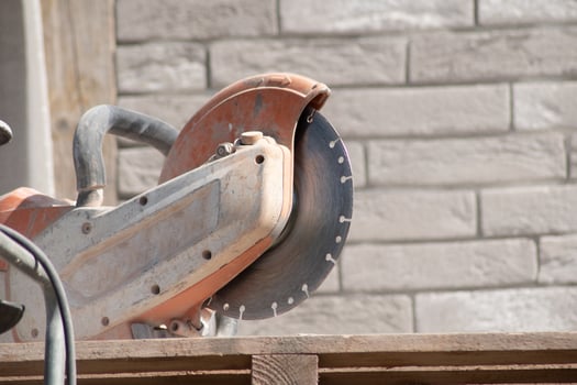 motion blur working concrete saw for sawing bricks of the right size, using technologies, High quality photo