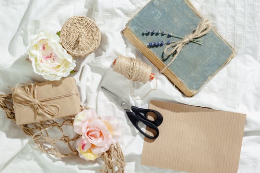 flowers with empty vintage notebook for your design photo