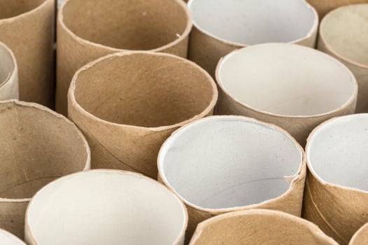 Empty toilet paper on white background photo
