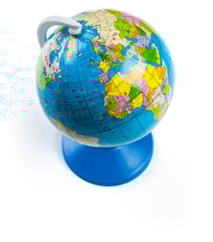 Colorful globe isolated against a white background photo