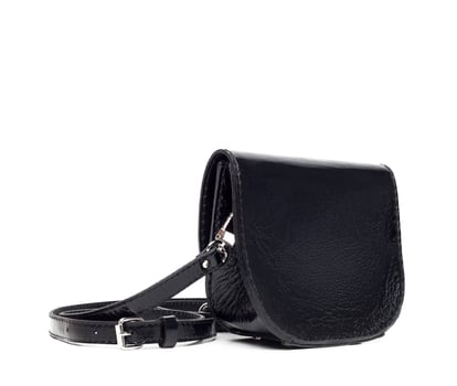 Leather female handbag isolated on white photo