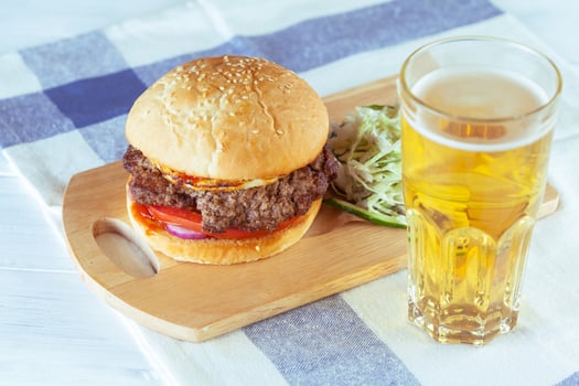 home made burgers on wooden background photo