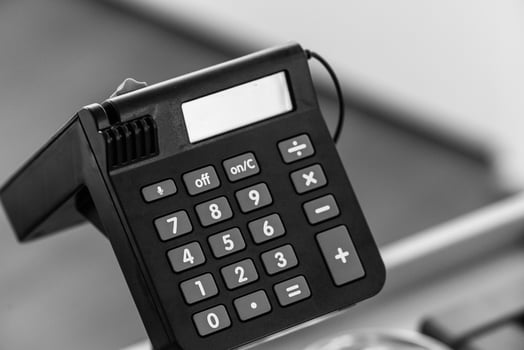 A black children's cash register, perfect for imaginative play photo