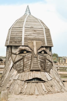 The big face of the wooden sculpture of the hero photo