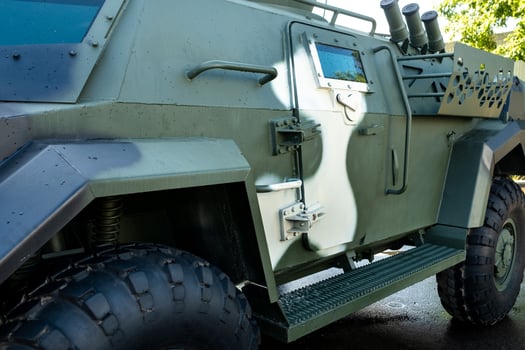 Military armored SUV of green color.Military concept photo
