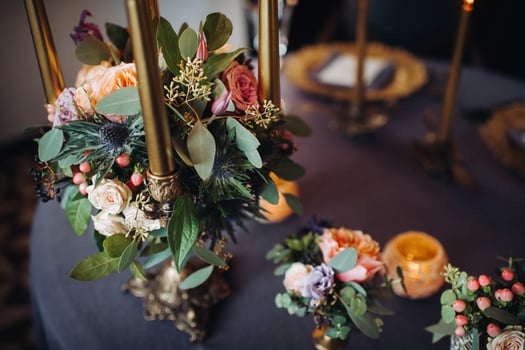 wedding table decoration with flowers on the table in the castle, table decor for dinner by candlelight.Dinner with candles photo