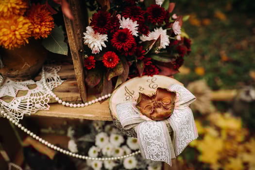 Autumn wedding ceremony on the street on the green lawn.Decor with arches of fresh flowers for the ceremony photo