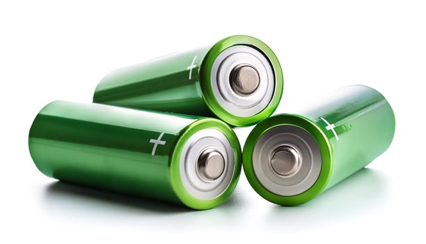 Three batteries, isolated on white background photo