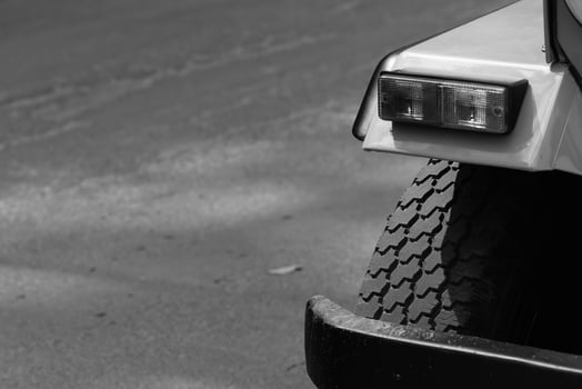 Pickup car are stopped on a dirt road. Off-road truck car wheels disassembly protection. photo