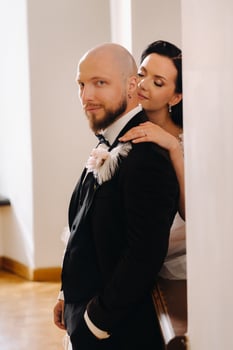 Elegant wedding couple in the interior of the old castle in the city of Nesvizh photo