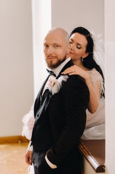 Elegant wedding couple in the interior of the old castle in the city of Nesvizh photo