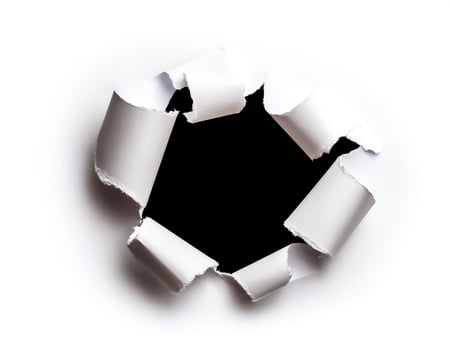 a white paper hole torn photo