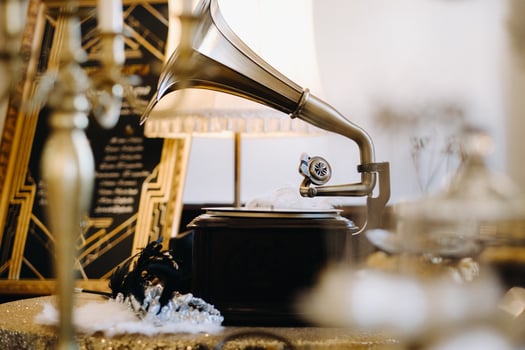 An old retro gramophone is playing a record photo