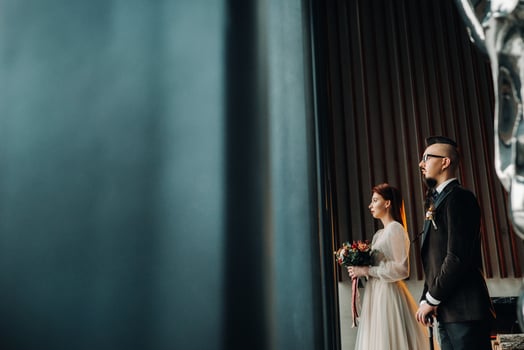 Stylish wedding couple in the interior. Glamorous bride and groom photo