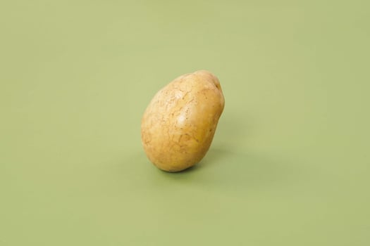 Washed potatoes, organic potato isolated on white background. Young potatoes. Peel potatoes.Harvesting collection. organic, freshly dug potatoes. Vegan. Vegetables.Potato slices. photo