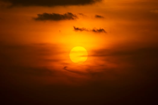 Sunset sky at the lake with clouds photo
