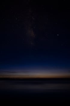 Vertical image of The sky with star at the lake in the twilight sky photo